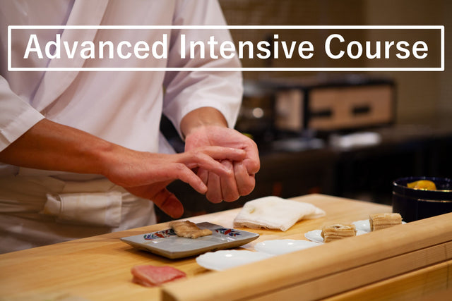 Advanced Intensive Course: a chef shaping nigiri sushi by hand at a hinoki wood sushi counter